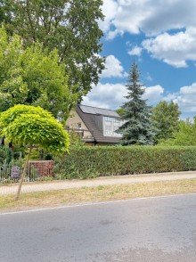 Stra�enansicht Modern & nachhaltig wohnen: Tolles Einfamilienhaus mit Wintergarten und PV-Anlage in Woltersdorf!