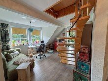OG Zimmer mit Zugang zum Schlafboden Modern & nachhaltig wohnen: Tolles Einfamilienhaus mit Wintergarten und PV-Anlage in Woltersdorf!