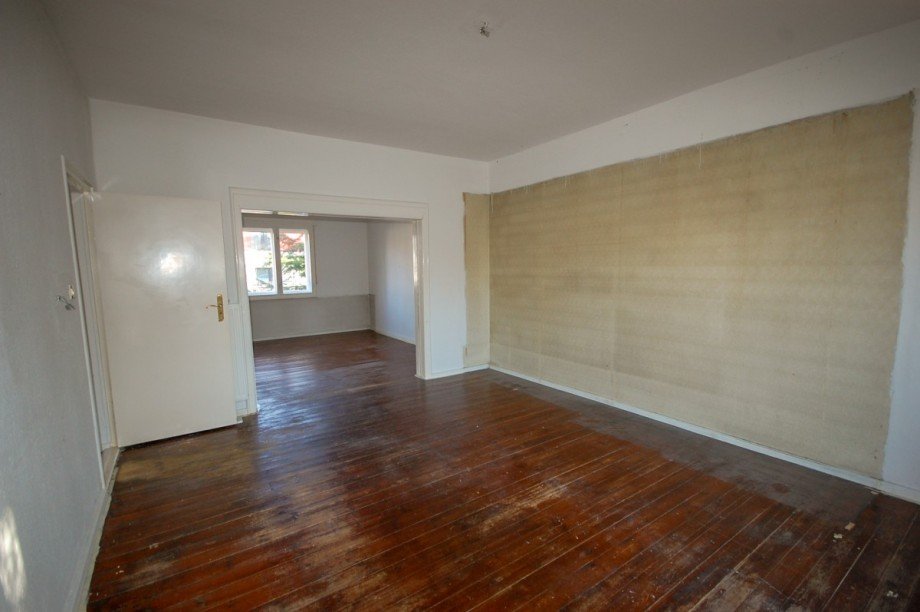 Wohnzimmer mit Blick ins Esszimmer Terrassenwohnung Berlin