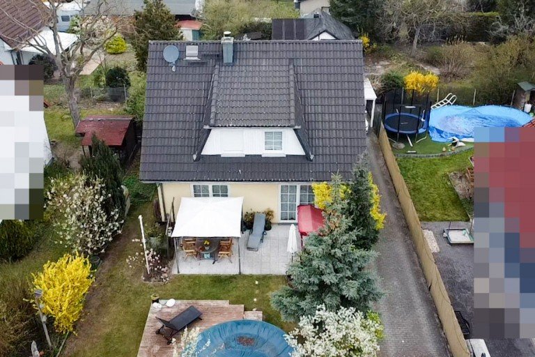Gartenansicht Berlin - Altglienicke Einfamilienhaus Sonniges Einfamilienhaus mit Pool in zweiter Reihe!
