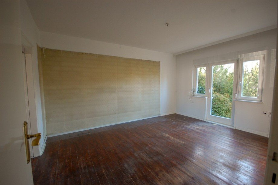 Wohnzimmer mit Zugang zur Terrasse Terrassenwohnung Berlin